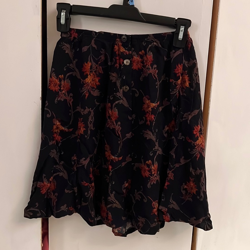 black and flowered skirt